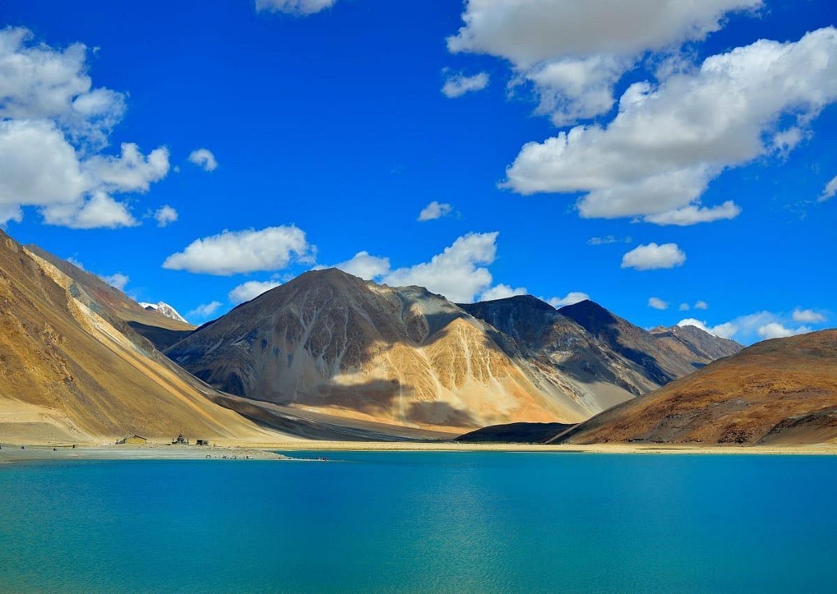 Turquoise Pangong Tso against bare hills