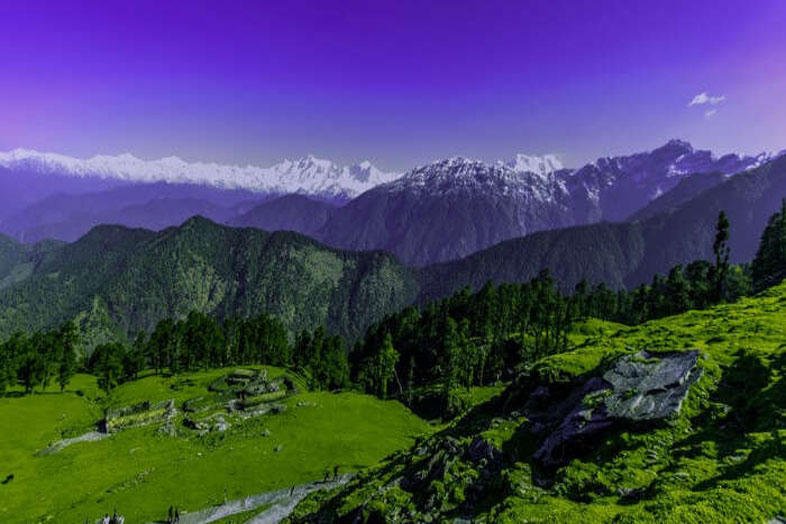 Chopta meadows and Himalayan wall